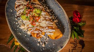 Frida Midtown signature dishes EnchiladasSteak FajitasArroz ChaufaAnticuchos